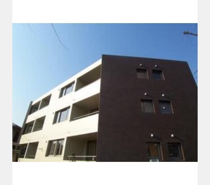 Main exterior of green villa